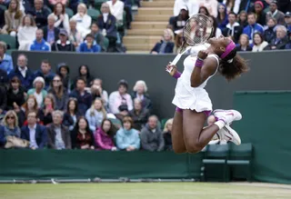 A Winning Look - The tennis star was ladylike in white and hints of pink when she won her fifth Wimbledon title last summer.  (Photo by Julian Finney/Getty Images)