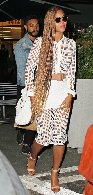 Beyoncé - Bey is spotted out and about in New York City in this see-through ensemble paired with a nude colored belt and matching strappy heels.  (Photo: Splash News)