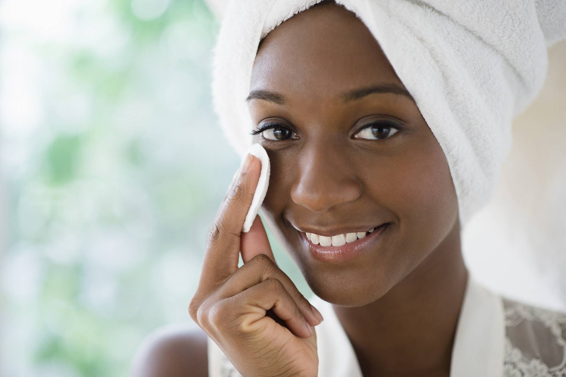 woman cleaning skin