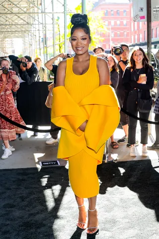 Yellow, Mellow, And In Her Bun