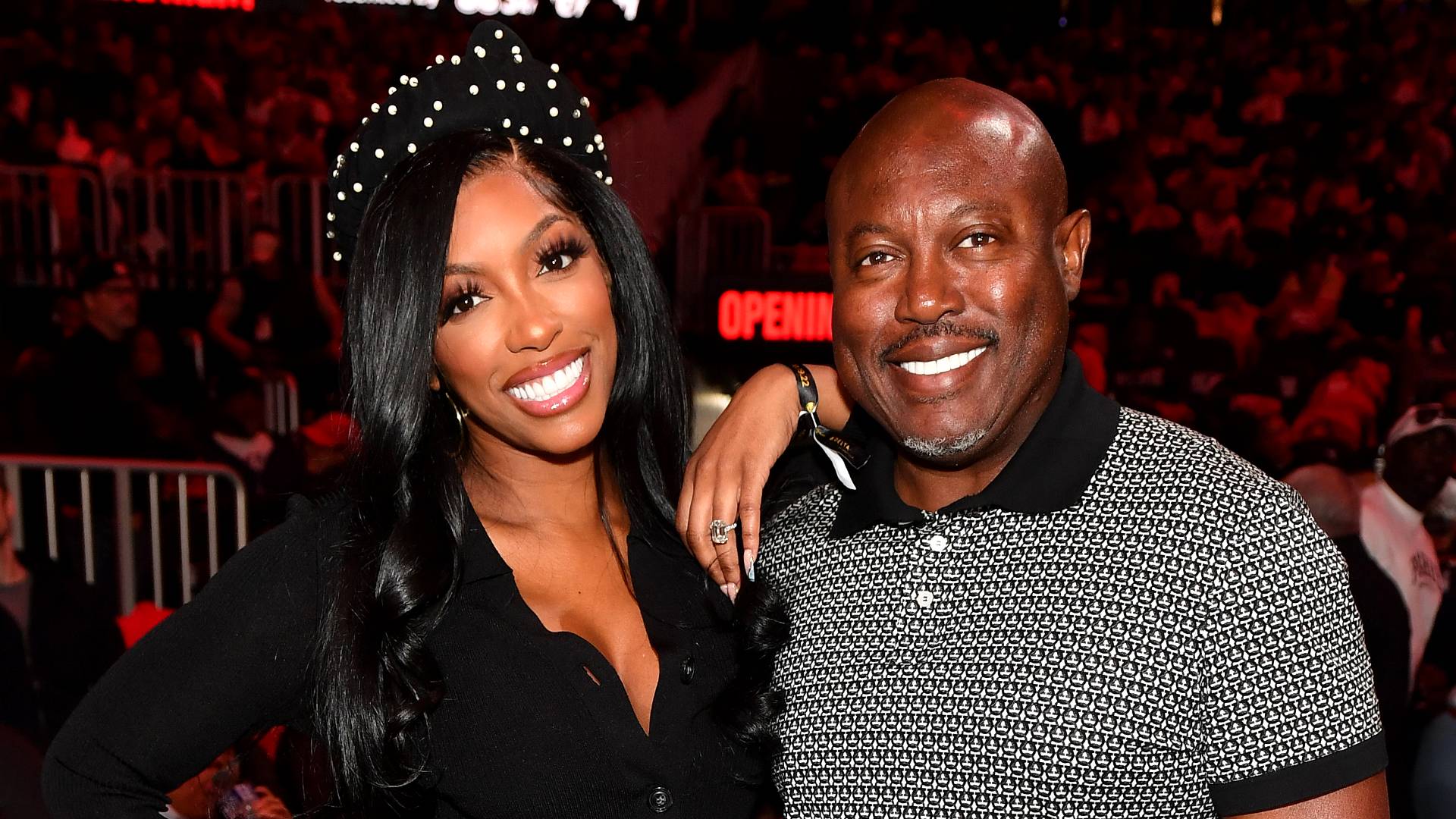 Porsha Williams and Simon Guobadia attend the season home opener game between the Houston Rockets and the Atlanta Hawks at State Farm Arena on October 19, 2022 in Atlanta, Georgia. 
