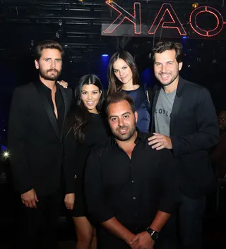 The Lord and Lady of Las Vegas - Reality stars Scott Disick and Kourtney Kardashian party at 1OAK with a group of pals. (Photo: Gabe Ginsberg/WireImage)