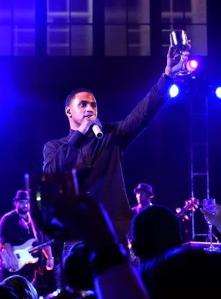 Pop Champagne - Trey Songz raises a toast on stage during the Moet Nectar Imperial Rose x Marcelo Burlon launch in New York City.   (Photo: Andrew H. Walker/Getty Images for Moet)