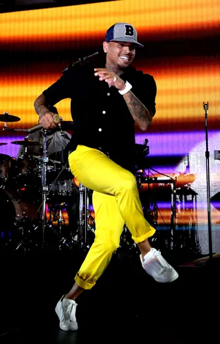 Not-So-Mellow Yellow - Chris Brown makes a bold statement below the belt at the iHeartRadio Summer Pool Party at Caesars Palace in Las Vegas. (Photo: Isaac Brekken/Getty Images for iHeartMedia)