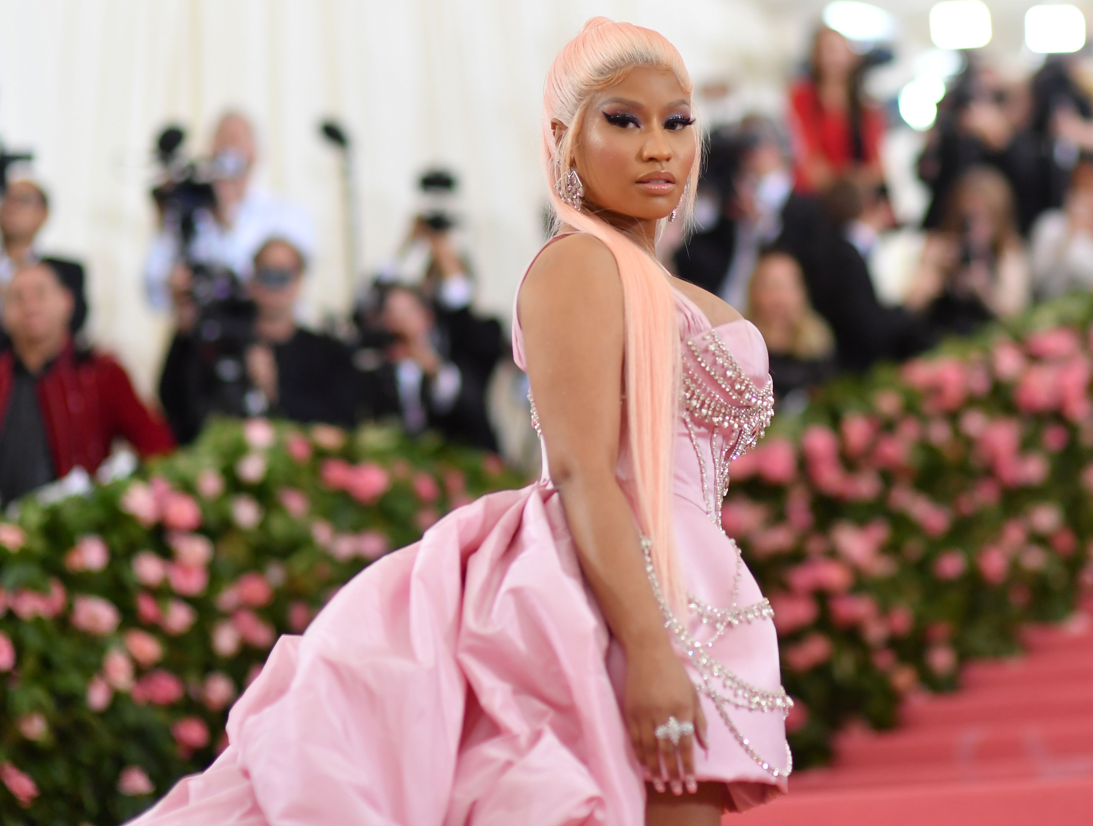 US rapper Nicki Minaj arrives for the 2019 Met Gala at the Metropolitan Museum of Art on May 6, 2019, in New York. - The Gala raises money for the Metropolitan Museum of Arts Costume Institute. The Gala's 2019 theme is Camp: Notes on Fashion" inspired by Susan Sontag's 1964 essay "Notes on Camp". (Photo by ANGELA  WEISS / AFP)        (Photo credit should read ANGELA  WEISS/AFP via Getty Images)