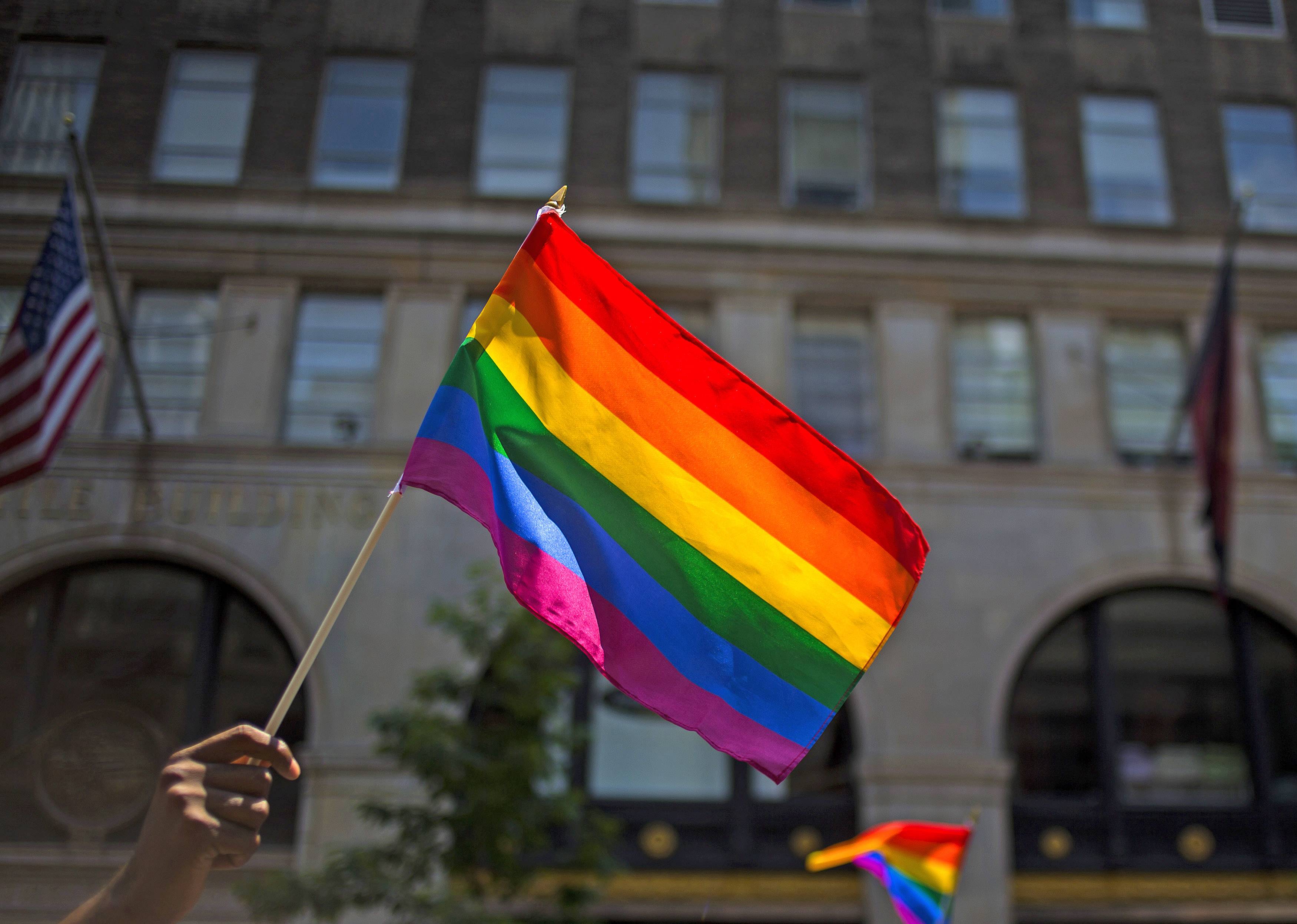 NEW YORK, NY - JUNE 29: Marchers walk down 5th Avenue during the 2014 Gay Pride March on June 29, 2014 in New York City. Thousands of marchers attended the parade route, which started at 36th Street and Fifth Avenue and ended at Greenwich and Christopher streets. The parade ended at the Stonewall Inn, where New York marchers commemorated the 45th anniversary of the 1969 riots, which are credited with launching the modern gay rights movement. New York Gov. Andrew Cuomo and New York City's Mayor Bill de Blasio were in attendance along with grand marshals Laverne Cox, transgender actress and activist, actor Jonathan Groff and Rea Carey, Executive Director of the National Gay and Lesbian Task Force.