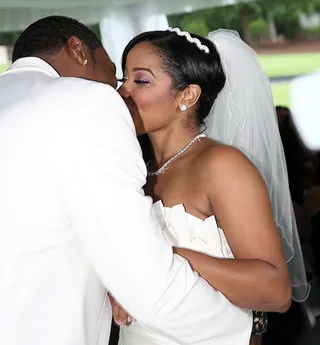 First Kiss as Mr. &amp; Mrs.  - Toya and Memphitz share their first official kiss as husband and wife!(Photo: Cornell Wheeler)