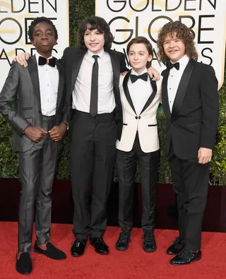 Caleb McLaughlin with Stranger Things cast - (Photo: Frazer Harrison/Getty Images)