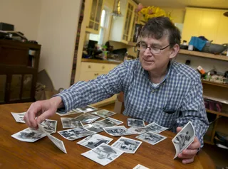 Michael Clurman Looks Back on Historic Summer - Michael Clurman was a former volunteer at &quot;Freedom Schools.&quot; He joined with DeBerry and knocked on doors to encourage people to register to vote. Clurman looks over photos from the historic summer.&nbsp;(Photo: AP Photo/Richard Drew)