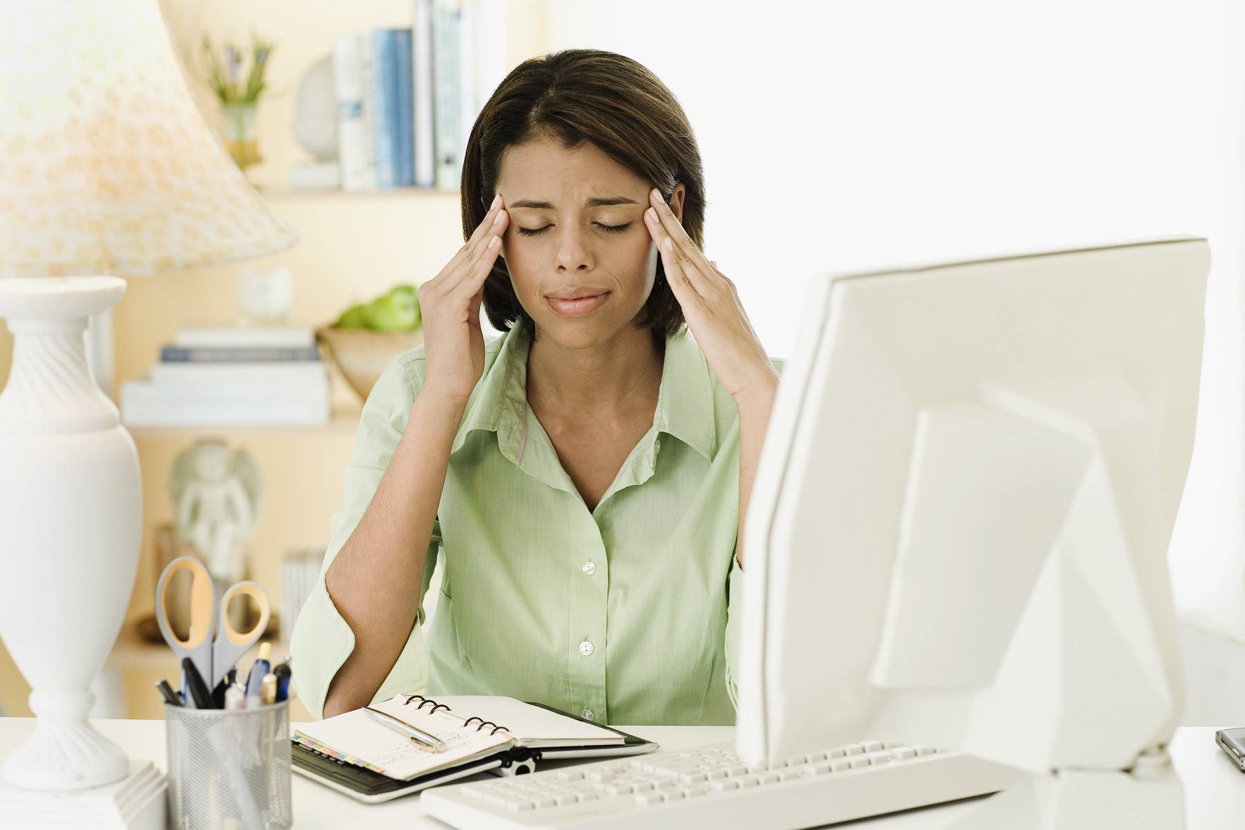 Stressed Woman at Home Computer