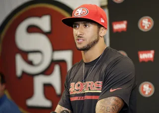 /content/dam/betcom/images/2014/06/Sports-06-01-06-15/061314-sports-Colin-Kaepernick.jpg