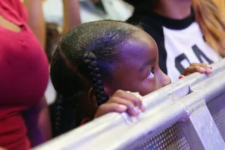 VIEW FROM BELOW - Even the littlest fans got a good view of the BETX Music Matters stage.&nbsp;(Photo: Jesse Grant/BET/Getty Images for BET)