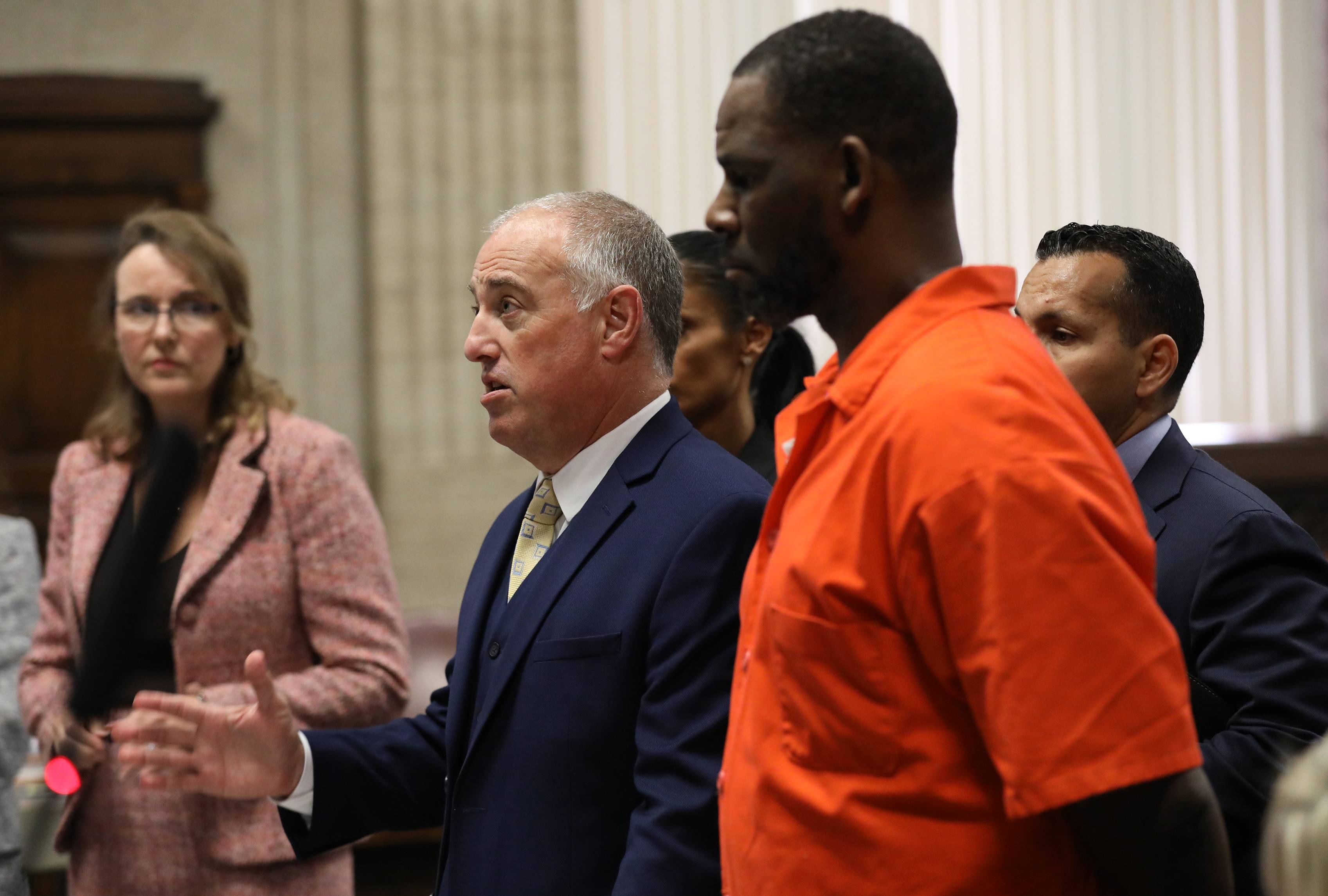 CHICAGO, IL -  SEPTEMBER 17:  Singer R. Kelly appears standing beside his attorney, Steven Greenberg during a hearing at the Leighton Criminal Courthouse on September 17, 2019 in Chicago, Illinois.  Kelly is facing multiple sexual assault charges and is being held without bail.   (Photo by Antonio Perez - Pool via Getty Images)