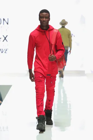 Red Alert - A monochromatic palette is always hot. The ribbed texture along the skinny denim gives an overall futuristic twist.  (Photo: Chelsea Lauren/BET/Getty Images for BET)