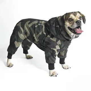 Green Camo Snow Dog Overall - There's a reason why dogs are considered to be our best friends. They're unshakable in their loyalty and limitless with their cuddles. Treat your pet to some brand new accessories guaranteed to have them barking for joy.&nbsp;By Patrice Peck  Keep your favorite pooch warm in cold weather with these camo snow overalls and you’ll be the coolest pair at the neighborhood dog park. The snowsuit also opens at the back for your pup to do his business comfortably.  (Photo: B**ch New York)