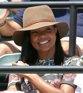 Showing Love - Being Mary Jane star&nbsp;Gabrielle Union watches the Women's Final of the Miami Open and cheers on her friend Serena Williams as she wins the finals against Carla Suarez.(Photo: Mike Ehrmann/Getty Images)