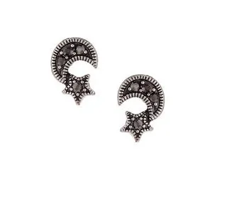 Topshop Star Moon Stud Earrings ($9) - A simple earring will feel comfortable under those headphones and shine bright when you’re posing for pics. How cute is the gemstone detailing on this moon-and-star-themed set?  (Photo: Topshop)