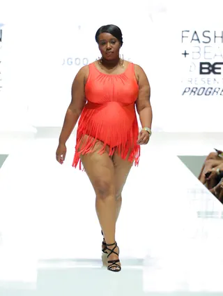 Fringed and Fine - Feeling the fringe trend this season? Bring that lovely detail into your swimwear wardrobe. Add a poppin’ salmon hue like this and watch the compliments come rolling in.  (Photo: Chelsea Lauren/BET/Getty Images for BET)