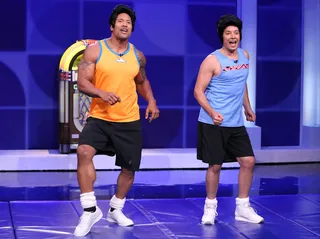 Two Wild and Crazy Guys - Dwayne &quot;The Rock&quot; Johnson and host Jimmy Fallon have a blast filming the &quot;Pomanti Brothers Fitness Video&quot; skit on The Tonight Show Starring Jimmy Fallon. &nbsp;(Photo: Douglas Gorenstein/NBC/NBCU Photo Bank via Getty Images)