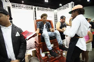 SHOE SHINE - Sneaker fans got their kicks touched up at the 2015 BET Experience.&nbsp;(Photo: Tommaso Boddi/Getty Images for BET)