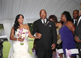 Finally Time  - It's finally time for Toya to walk down the aisle. Her father Walter is proud as any dad could be. (Photo: Cornell Wheeler)