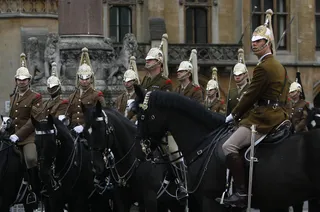 Rehearsal—Household Calvary - Soldiers of the Household Cavalry wait for orders outside Westminster Abbey as they take part in an overnight dress rehearsal for the Royal Wedding.(Photo: AP Photo/Alastair Grant)