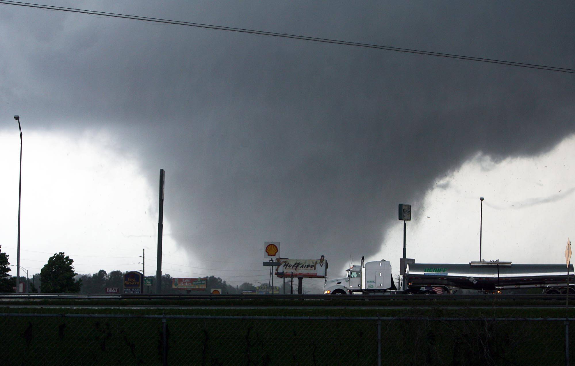 Storm Funnel - One of the hardest-hit areas was Tuscaloosa, a city of more than 83,000 and home to the University of Alabama. A massive tornado barreled through late Wednesday afternoon, leveling the city. &lt;br&gt;&lt;br&gt;(Photo: AP Photo/The Tuscaloosa News, Dusty Compton)