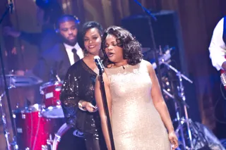 Chiming In\r - Mo'Nique shares some positives words with the singer on stage.\r&nbsp;\r(Photo: Darnell Williams/BET)