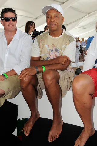 Woosa! - No drama here! A relaxed Russell Simmons goes with the flow during a serene sit-down at a Beach Polo event in Miami.(Photo: Jeff Daly/PictureGroup)