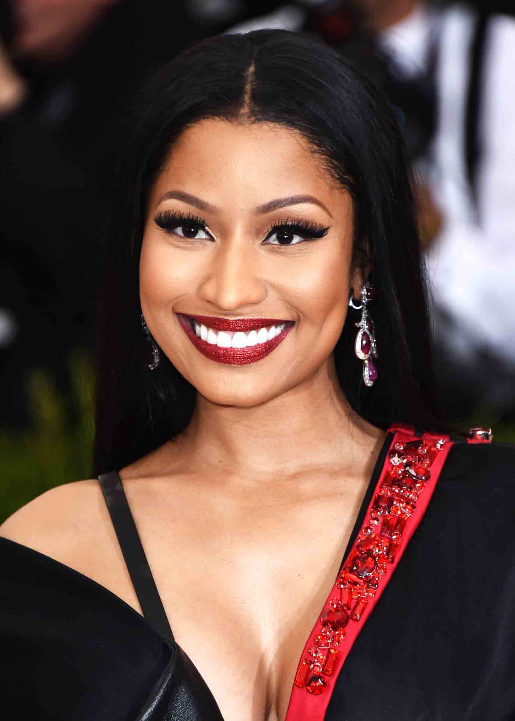 Nicki Minaj Photo Image 18 from See 26 Celebs Who Got A Bag And Fixed Their Teeth BET