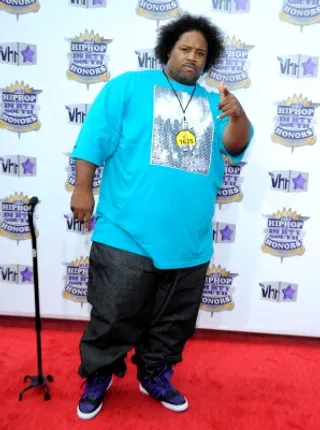 Bone Crusher - Bone Crusher wore a blue graphic tee and dark denim jeans.<br><br>(Photo Credit: PictureGroup)