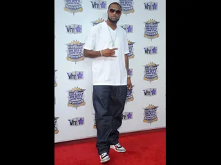 Slim Thug - Slim Thug cooled out on the carpet in a white tee and red-rimmed shades.<br><br>(Photo Credit: PictureGroup)
