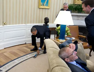 What Is He Doing? - Swatting a fly.  (Photo: Official White House Photo by Pete Souza)