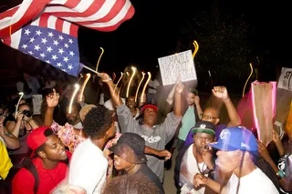 United We Stand - A protest on S. Florissant was held by the Organization for Black Struggle (OBS) to give white people a chance to show unity with the movement.&nbsp;(Photo: Lucas Alvarado-Farrar/Whose Streets Media)