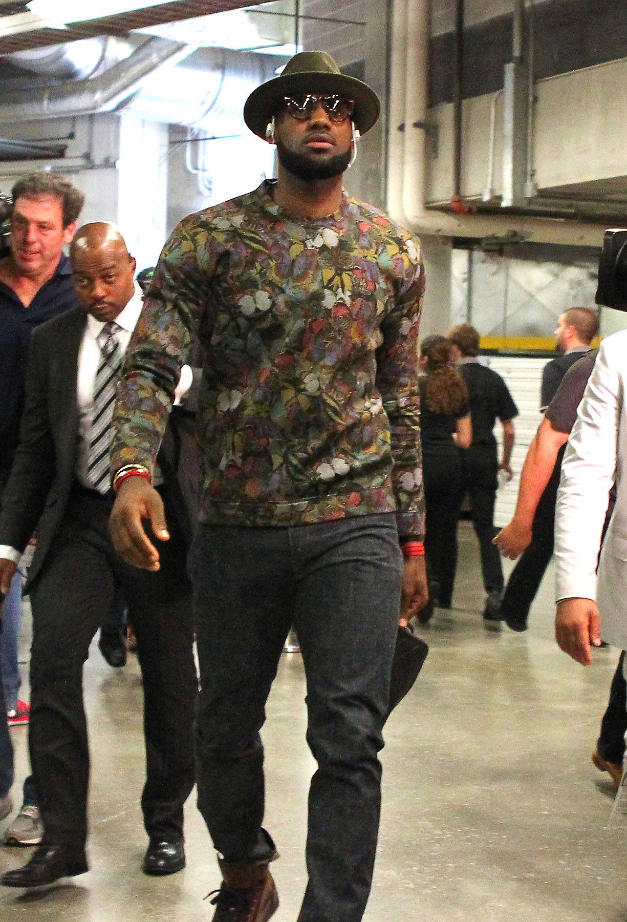 The King on Christmas - Cleveland Cavaliers forward LeBron James walking in to the clubhouse on Christmas day preparing to take on his former teammates from the Miami Heat in Miami.(Photo: David Santiago/El Nuevo Herald/TNS via Getty Images)