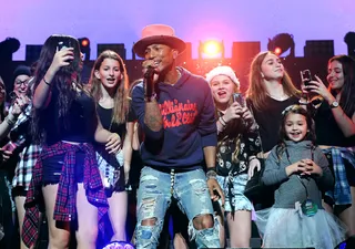 Bring on the Happy&nbsp; - Pharrell Williams performs onstage during Y100's Jingle Ball 2014 at BB&amp;T Center in Miami.(Photo: Larry Marano/Getty Images for iHeartMedia)