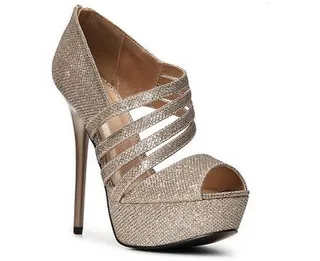 Qupid Daydream-23 Platform Pump ($35) - Light up your New Year’s Eve with a touch of glitter on your feet. These sparkling nude pumps are perfect for an ultra-feminine look.   (Photo: DSW)