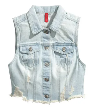 H&amp;M Denim Vest ($15) - A denim vest can top off an outfit that needs a little extra help. Take a regular graphic tank and add one of these and you’ll look like da bomb!  (Photo: H&amp;M)