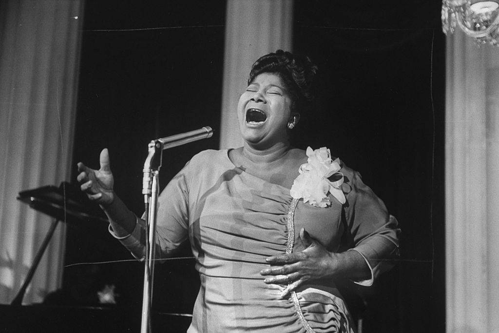 Singer Mahalia Jackson singing at reception in hotel.  (Photo by Don Cravens/The LIFE Images Collection via Getty Images/Getty Images)