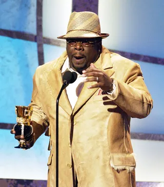 /content/dam/betcom/shows/betawards/041812-shows-bet-awards-history-2002-performances-cedric-entertainer.jpg