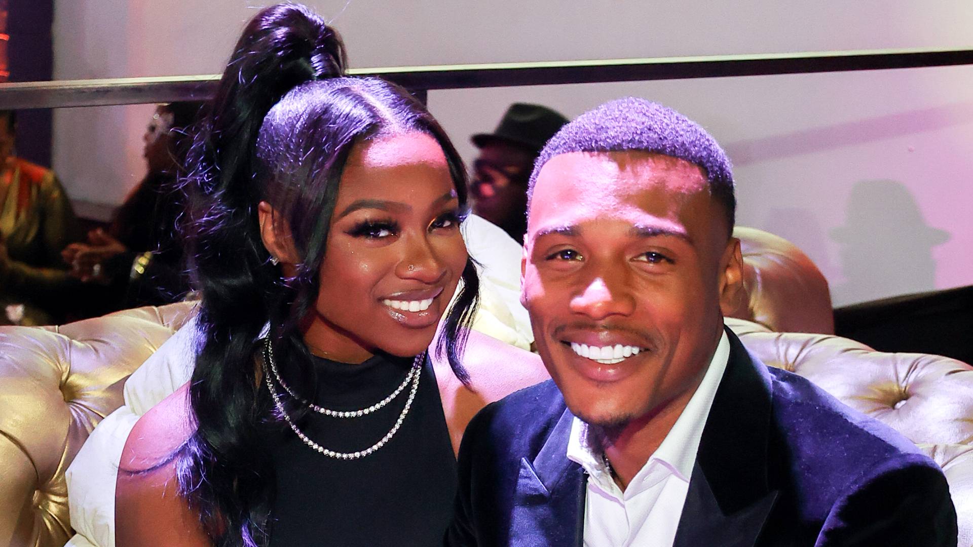 Reginae Carter and Armon Warren attend Atlanta Masquerade Gala at Revel on October 20, 2022 in Atlanta, Georgia.