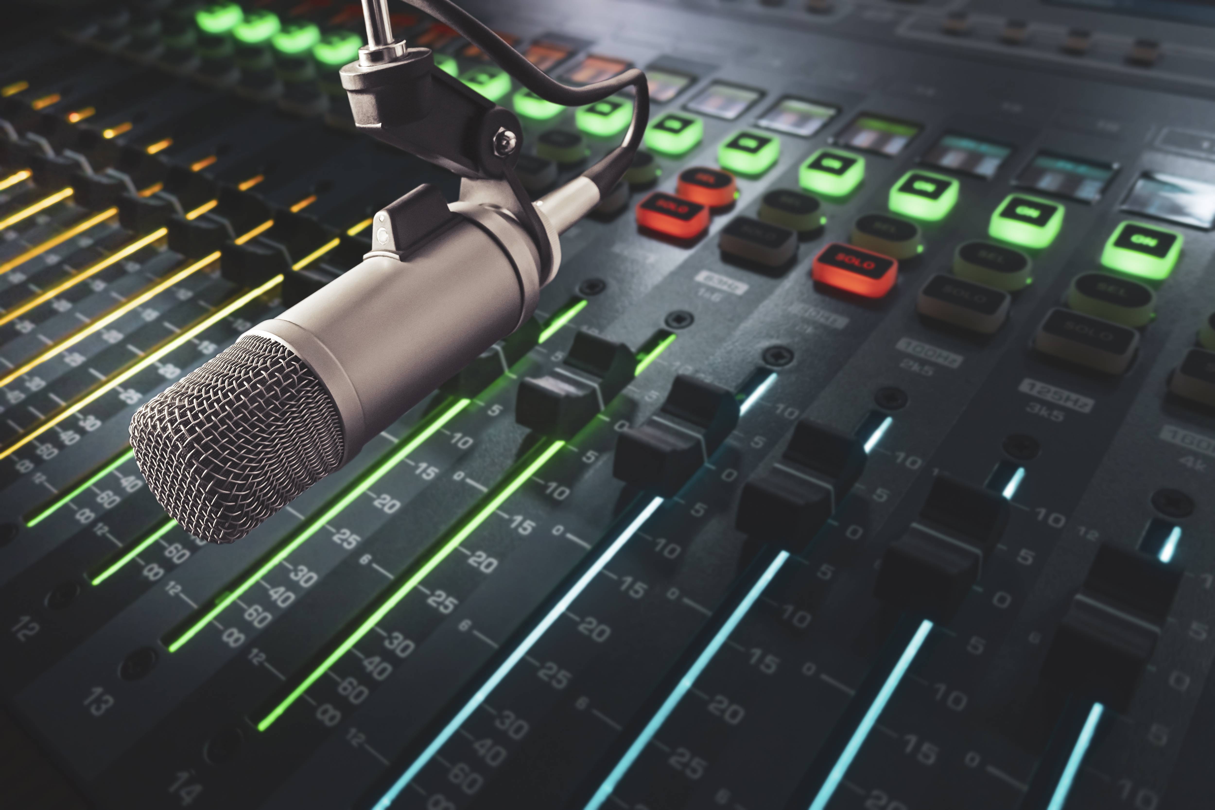 Professional microphone and audio mixer in radio studio