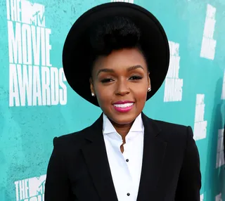 Janelle Monae (@JanelleMonae) - TWEET: "finally met Johnny. Great guy."  Janelle Monae tweets a photo of herself and Johnny Depp at the MTV Movie Awards this past weekend.(Photo: Christopher Polk/Getty Images)
