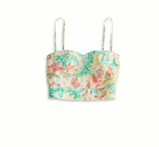 AE Floral Corset - What better time to wear floral than springtime? This cream-colored corset is delightful and brings to mind a fresh pair of high-waist jeans. By Patrice Peck  (Photo: American Eagle)