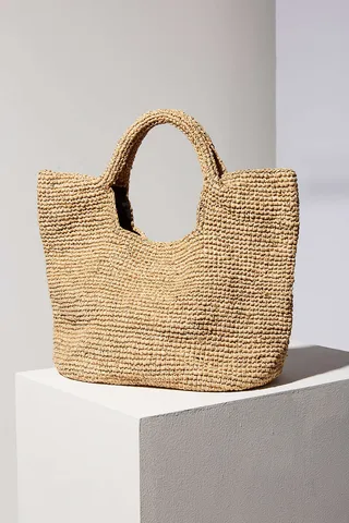 Neutral Beach Bag - Not all of your summery accessories&nbsp;have to go under the bed.&nbsp;Your crocheted&nbsp;beach bag can add great&nbsp;texture to your fall pieces sans the sand.&nbsp;We like:&nbsp;Ecote Raffia Tote&nbsp;Bag ($69).(Photo: Urban Outfitters)&nbsp;
