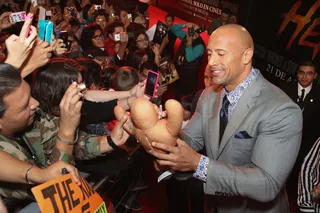 Hercules, Hercules! - Dwayne &quot;The Rock&quot; Johnson signs autographs for fans at the Latin American premiere of Hercules at Cinemex Antara in Mexico City. (Photo: Victor Chavez/Getty Images for Paramount Pictures International)