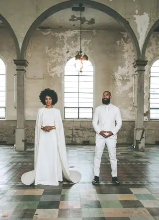 Best Wedding Style: Solange Knowles and Alan Ferguson - Adorable two-wheeled wedding day transportation? Check. Natural hair (and beard) on fleek? Check. Exclusive Vogue coverage? Check. Badass matching cream ensembles? Yup! Talk about iconic looks; folks will be trying to re-create their wedding style for years to come.   (Photo: VOGUE by Rog Walker)