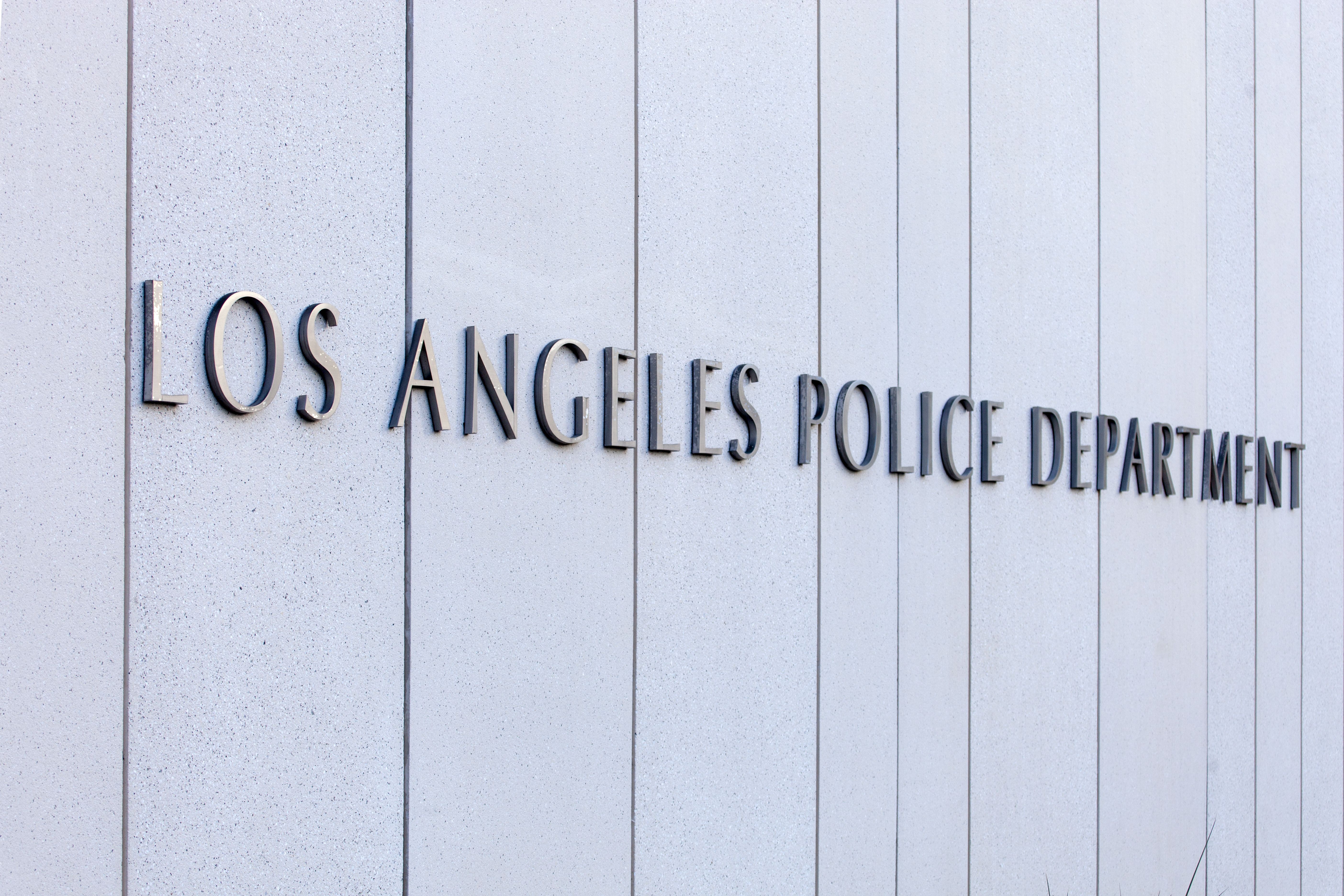 Metal lettering on a wall depicting the headquarters of the Los Angeles Police Department.