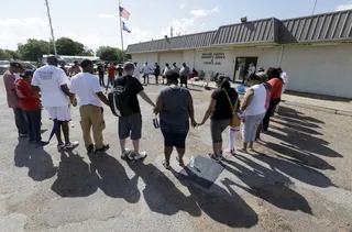 Circle of Prayer - (Photo: Melissa Phillip/Houston Chronicle via AP)