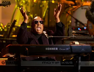 Stevie Wonder Honors Dick Clark - Stevie Wonder performs a special tribute to late AMA founder and broadcast legend Dick Clark.(Photo: Kevin Winter/Getty Images)